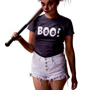 Girl in scary Halloween face makeup, carrying a bat, wearing a shirt that says Boo!