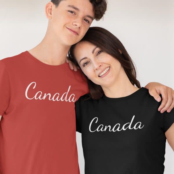 Canada Tshirt - couple standing in red and black tshirts that have Canada written on the chest.